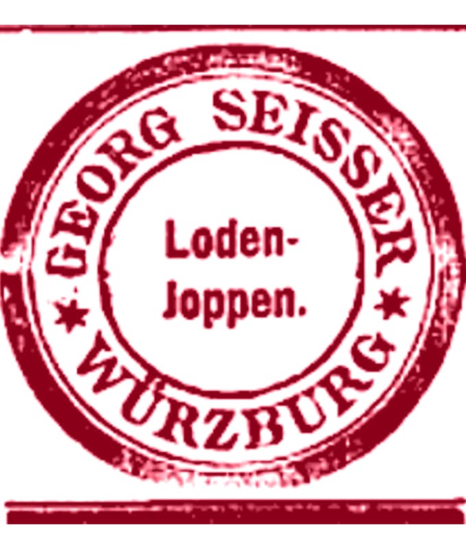 Ein roter Rundstempel mit dem Text "GEORG SEISSER * WÜRZBURG *" am Rand und "Loden-Joppen." in der Mitte.